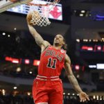 
              Chicago Bulls forward DeMar DeRozan (11) dunks against the Milwaukee Bucks during an NBA basketball game Wednesday, Nov. 23, 2022, in Milwaukee. (AP Photo/Jeffrey Phelps)
            