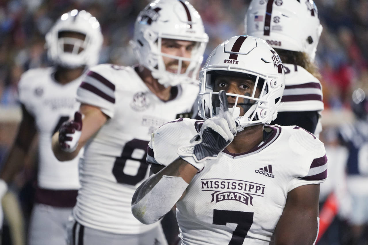 Mississippi State running back Jo'quavious Marks (7) gestures after scoring on a 1-yard touchdown r...