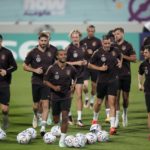 
              Germany's Serge Gnabry, center, leads the field during a training session at the Al-Shamal stadium on the eve of the group E World Cup soccer match between Germany and Spain, in Al-Ruwais, Qatar, Friday, Nov. 25, 2022. Germany will play the second match against Spain on Sunday, Nov. 27. (AP Photo/Matthias Schrader)
            