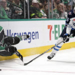 
              Dallas Stars defenseman Colin Miller (6) and Winnipeg Jets right wing Blake Wheeler (26) skate for the puck during the second period of an NHL hockey game in Dallas, Friday, Nov. 25, 2022. (AP Photo/LM Otero)
            