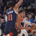 
              Atlanta Hawks guard Trae Young drives against New York Knicks guard Jalen Brunson (11) during the first half of an NBA basketball game Wednesday, Nov. 2, 2022, at Madison Square Garden in New York. (AP Photo/Mary Altaffer)
            