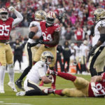 
              San Francisco 49ers defensive end Drake Jackson (95) reacts after defensive end Nick Bosa, bottom right, sacked New Orleans Saints quarterback Andy Dalton, bottom middle, during the second half of an NFL football game in Santa Clara, Calif., Sunday, Nov. 27, 2022. (AP Photo/Godofredo A. Vásquez)
            