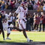 
              Arkansas quarterback KJ Jefferson runs into the end zone for a touchdown during the first quarter of an NCAA college football game against Missouri, Friday, Nov. 25, 2022, in Columbia, Mo. (AP Photo/L.G. Patterson)
            