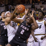 
              Penn's Max Lorca-Lloyd, from left, Noah Carter, Jonah Charles and Kobe Brown scramble for rebound during the second half of an NCAA college basketball game Friday, Nov. 11, 2022, in Columbia, Mo. Missouri won 92-85. (AP Photo/L.G. Patterson)
            