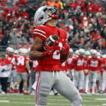 
              Ohio State wide receiver Emeka Egbuka celebrates his touchdown against Indiana during the first half of an NCAA college football game Saturday, Nov. 12, 2022 in Columbus, Ohio. (AP Photo/Paul Vernon)
            