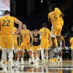 
              Southern Mississippi players celebrate after a win over Vanderbilt in an NCAA college basketball game Friday, Nov. 11, 2022, in Nashville, Tenn. Southern Mississippi won 60-48. (AP Photo/Mark Humphrey)
            