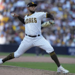
              San Diego Padres relief pitcher Robert Suarez throws during the seventh inning in Game 2 of the baseball NL Championship Series between the San Diego Padres and the Philadelphia Phillies on Wednesday, Oct. 19, 2022, in San Diego. (AP Photo/Gregory Bull)
            