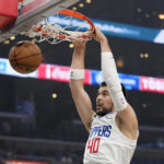 
              Los Angeles Clippers center Ivica Zubac dunks during the first half of an NBA basketball game against the Indiana Pacers Sunday, Nov. 27, 2022, in Los Angeles. (AP Photo/Mark J. Terrill)
            