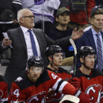 
              New Jersey Devils coach Lindy Ruff reacts after a goal was called off during the second period of the team's NHL hockey game against the Toronto Maple Leafs on Wednesday, Nov. 23, 2022, in Newark, N.J. (AP Photo/Adam Hunger)
            