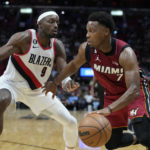 
              Miami Heat guard Kyle Lowry (7) drives to the basket against Portland Trail Blazers forward Jerami Grant (9) during the second half of an NBA basketball game, Monday, Nov. 7, 2022, in Miami. (AP Photo/Wilfredo Lee)
            