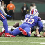 
              Buffalo Bills' Von Miller (40) forces New York Jets quarterback Zach Wilson (2) to fumble during the second half of an NFL football game, Sunday, Nov. 6, 2022, in East Rutherford, N.J. (AP Photo/John Minchillo)
            