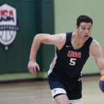 
              Jimmer Fredette is in action during practice for the USA Basketball 3x3 national team, Monday, Oct. 31, 2022, in Miami Lakes, Fla. (AP Photo/Lynne Sladky)
            