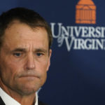 
              University of Virginia President Jim Ryan listens during a news conference, Monday, Nov. 14, 2022, in Charlottesville. Va. A University of Virginia student was taken into custody Monday after fatally shooting three members of the school’s football team as they were returning to campus Sunday night from a field trip, officials said. (AP Photo/Steve Helber)
            