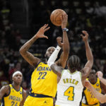 
              Indiana Pacers' Isaiah Jackson (22) tips the ball away from Houston Rockets' Jalen Green (4) during the first half of an NBA basketball game Friday, Nov. 18, 2022, in Houston. (AP Photo/David J. Phillip)
            