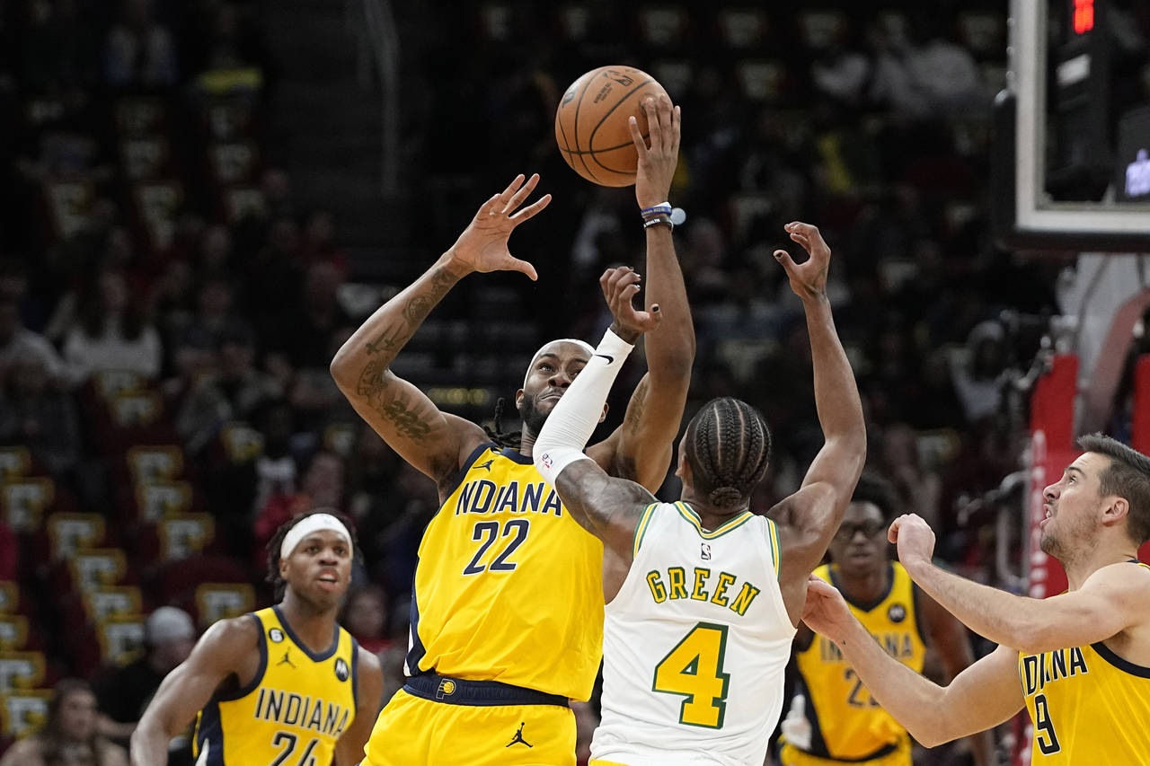 Indiana Pacers' Isaiah Jackson (22) tips the ball away from Houston Rockets' Jalen Green (4) during...