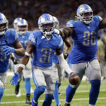 
              Detroit Lions safety Kerby Joseph (31) and teammates react after a play during the second half of an NFL football game against the Green Bay Packers, Sunday, Nov. 6, 2022, in Detroit. (AP Photo/Paul Sancya)
            