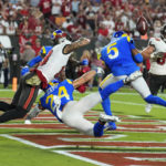 
              Los Angeles Rams cornerback Jalen Ramsey (5) breaks up a pass intended for Tampa Bay Buccaneers wide receiver Mike Evans (13) during the second half of an NFL football game between the Los Angeles Rams and Tampa Bay Buccaneers, Sunday, Nov. 6, 2022, in Tampa, Fla. (AP Photo/Chris O'Meara)
            