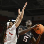 
              South Carolina's Laeticia Amihere looks to shoot as Maryland's Brinae Alexander defends during the first half of an NCAA college basketball game Friday, Nov. 11, 2022, in College Park, Md. (AP Photo/Gail Burton)
            