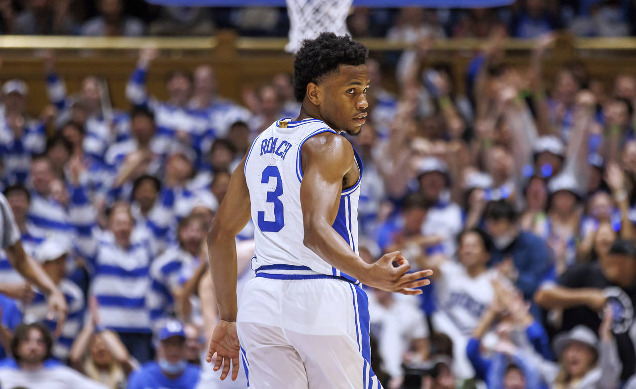Duke's Jeremy Roach (3) gestures to teammates after hitting a 3-pointer during the first half of th...