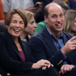 
              Britain's Prince William jokes with Massachusetts Gov.-elect Maura Healey during the first half of an NBA basketball game between the Miami Heat and the Boston Celtics on Wednesday, Nov. 30, 2022, in Boston. (AP Photo/Charles Krupa)
            