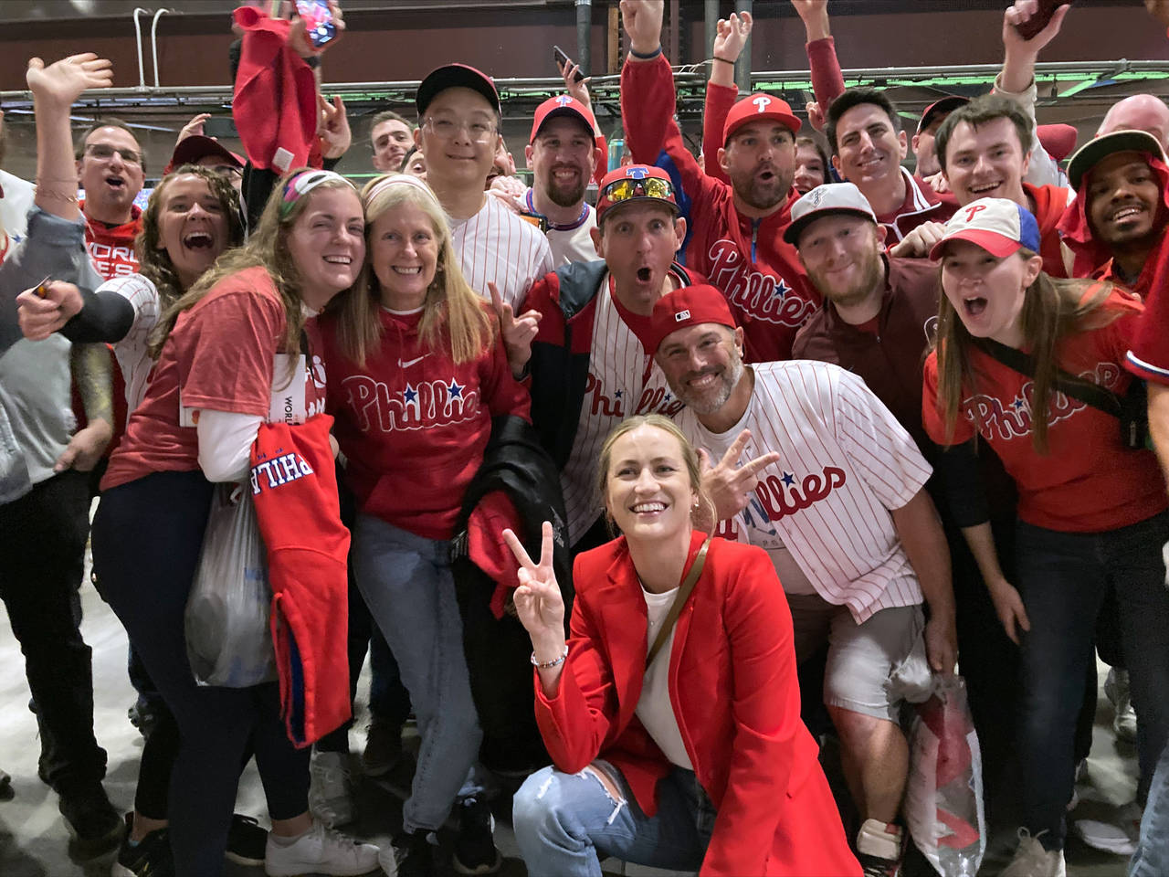 Jayme Hoskins, front, wife of Philadelphia Phillies first baseman Rhys Hoskins, poses with fans at ...