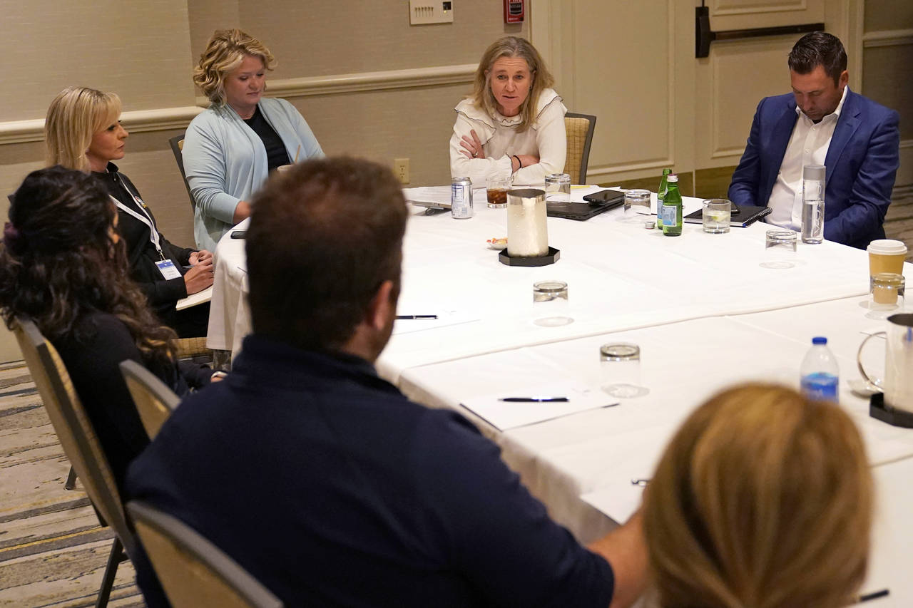 LPGA Commissioner Mollie Marcoux Samaan, second from right, speaks during a media roundtable at the...