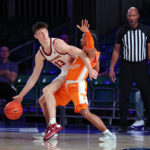 
              In a photo provided by Bahamas Visual Services, Southern California's Drew Peterson (13) works against Tennessee's Tyreke Key (5)  during an NCAA college basketball game in the Battle 4 Atlantis at Paradise Island, Bahamas, Thursday, Nov. 24, 2022. (Tim Aylen/Bahamas Visual Services via AP)
            