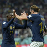 
              France's Adrien Rabiot, right, celebrates with his teammate Ousmane Dembele after scoring his side's opening goal during the World Cup group D soccer match between France and Australia, at the Al Janoub Stadium in Al Wakrah, Qatar, Tuesday, Nov. 22, 2022. (AP Photo/Francisco Seco)
            