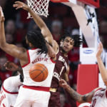 
              Boston College's T.J. Bickerstaff, second from right, works for a rebound against Nebraska's Juwan Gary, Derrick Walker and C.J. Wilcher, from left, during the first half of an NCAA college basketball game Wednesday, Nov. 30, 2022, in Lincoln, Neb. (AP Photo/Rebecca S. Gratz)
            