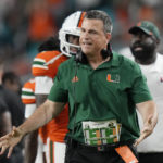 
              Miami head coach Mario Cristobal reacts during the first half of an NCAA college football game against Pittsburgh, Saturday, Nov. 26, 2022, in Miami Gardens, Fla. (AP Photo/Lynne Sladky)
            