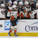 
              Anaheim Ducks left wing Max Comtois (44) is congratulated by teammates after he scored against the San Jose Sharks during the first period of an NHL hockey game in San Jose, Calif., Saturday, Nov. 5, 2022. (AP Photo/Jeff Chiu)
            