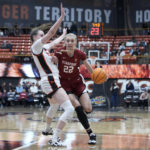 
              Stanford forward Cameron Brink (22) fouls Pacific forward Cecilia Holmberg, left, while driving to the basket during the second half of an NCAA college basketball game in Stockton, Calif., Friday, Nov. 11, 2022. (AP Photo/Godofredo A. Vásquez)
            