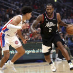 
              'Los Angeles Clippers forward Kawhi Leonard, right, is defended by Detroit Pistons guard Killian Hayes during the first half of an NBA basketball game Thursday, Nov. 17, 2022, in Los Angeles. (AP Photo/Raul Romero Jr.)
            