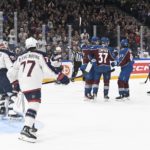 
              J.T. Compher, center, of Colorado Avalanche celebrates his 0-2 power play goal during the 2022 NHL Global Series ice hockey match between Columbus Blue Jackets and Colorado Avalanche in Tampere, Finland, Friday Nov. 4, 2022. (Emmi Korhonen/Lehtikuva via AP)
            