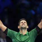 
              Serbia's Novak Djokovic celebrates after defeating Norway's Casper Ruud 7-5, 6-3, in their singles final tennis match of the ATP World Tour Finals at the Pala Alpitour, in Turin, Italy, Sunday, Nov. 20, 2022. (AP Photo/Antonio Calanni)
            