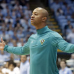 
              UNC Wilmington head coach Takayo Siddle gestures from the sideline during the first half of an NCAA college basketball game against North Carolina in Chapel Hill, N.C., Monday, Nov. 7, 2022. (AP Photo/Chris Seward)
            