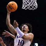 
              Kansas forward Jalen Wilson puts up a shot during the first half of an NCAA college basketball game against Southern Utah Friday, Nov. 18, 2022, in Lawrence, Kan. (AP Photo/Charlie Riedel)
            