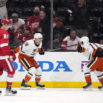 
              Anaheim Ducks center Ryan Strome (16) celebrate his overtime goal with center Trevor Zegras (11) as Detroit Red Wings left wing Dominik Kubalik (81) skates past, at the end of an NHL hockey game Tuesday, Nov. 15, 2022, in Anaheim, Calif. (AP Photo/Marcio Jose Sanchez)
            