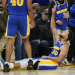 
              Golden State Warriors guard Stephen Curry (30) gestures after shooting a 3-point basket against the Sacramento Kings during the second half of an NBA basketball game in San Francisco, Monday, Nov. 7, 2022. (AP Photo/Jeff Chiu)
            