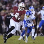 
              Stanford wide receiver Elijah Higgins (6) runs after a reception against BYU during the first half of an NCAA college football game in Stanford, Calif., Saturday, Nov. 26, 2022. (AP Photo/Godofredo A. Vásquez)
            