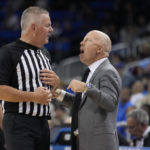 
              UCLA coach Mick Cronin, right, argues with a referee during the second half of the team's NCAA college basketball game against Sacramento State on Monday, Nov. 7, 2022, in Los Angeles. (AP Photo/Marcio Jose Sanchez)
            