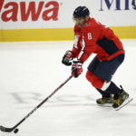 
              Washington Capitals left wing Alex Ovechkin skates with the puck during the third period of an NHL hockey game against the Philadelphia Flyers, Wednesday, Nov. 23, 2022, in Washington. The Capitals won 3-2 in overtime. (AP Photo/Nick Wass)
            