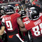 
              Atlanta Falcons players celebrate a touchdown by Atlanta Falcons running back Cordarrelle Patterson during the first half of an NFL football game against the Chicago Bears, Sunday, Nov. 20, 2022, in Atlanta. (AP Photo/John Bazemore)
            