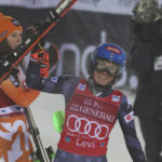
              United States' Mikaela Shiffrin celebrates next to third placed Slovakia's Petra Vlhova after winning an alpine ski, women's World Cup slalom, in Levi, Finland, Sunday, Nov. 20, 2022. (AP Photo/Alessandro Trovati)
            