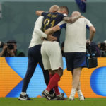 
              France's Lucas Hernandez is helped off the pitch during the World Cup group D soccer match between France and Australia, at the Al Janoub Stadium in Al Wakrah, Qatar, Friday, Nov. 4, 2022. (AP Photo/Frank Augstein)
            