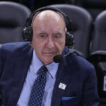 
              Dick Vitale prepares to announce an NCAA college basketball game between Michigan State and Kentucky, Tuesday, Nov. 15, 2022, in Indianapolis. (AP Photo/Darron Cummings)
            