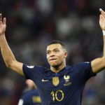 
              France's Kylian Mbappe celebrates scoring his side's third goal during the World Cup round of 16 soccer match between France and Poland, at the Al Thumama Stadium in Doha, Qatar, Sunday, Dec. 4, 2022. (AP Photo/Martin Meissner)
            