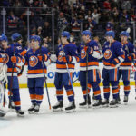 
              New York Islanders celebrate after defeating the Chicago Blackhawks in an NHL hockey game on Sunday, Dec. 4, 2022, in Elmont, N.Y. Islanders won 3-0. (AP Photo/Eduardo Munoz Alvarez)
            