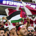 
              A fan waves a Palestinian flag prior to a World Cup group A soccer match between Qatar and Senegal at the Al Thumama Stadium in Doha, Qatar, Friday, Nov. 25, 2022. (AP Photo/Petr Josek)
            