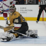 
              Vegas Golden Knights goaltender Logan Thompson (36) watches as he is scored on by New York Rangers center Mika Zibanejad for the second time during the third period of an NHL hockey game Wednesday, Dec. 7, 2022, in Las Vegas. (AP Photo/John Locher)
            